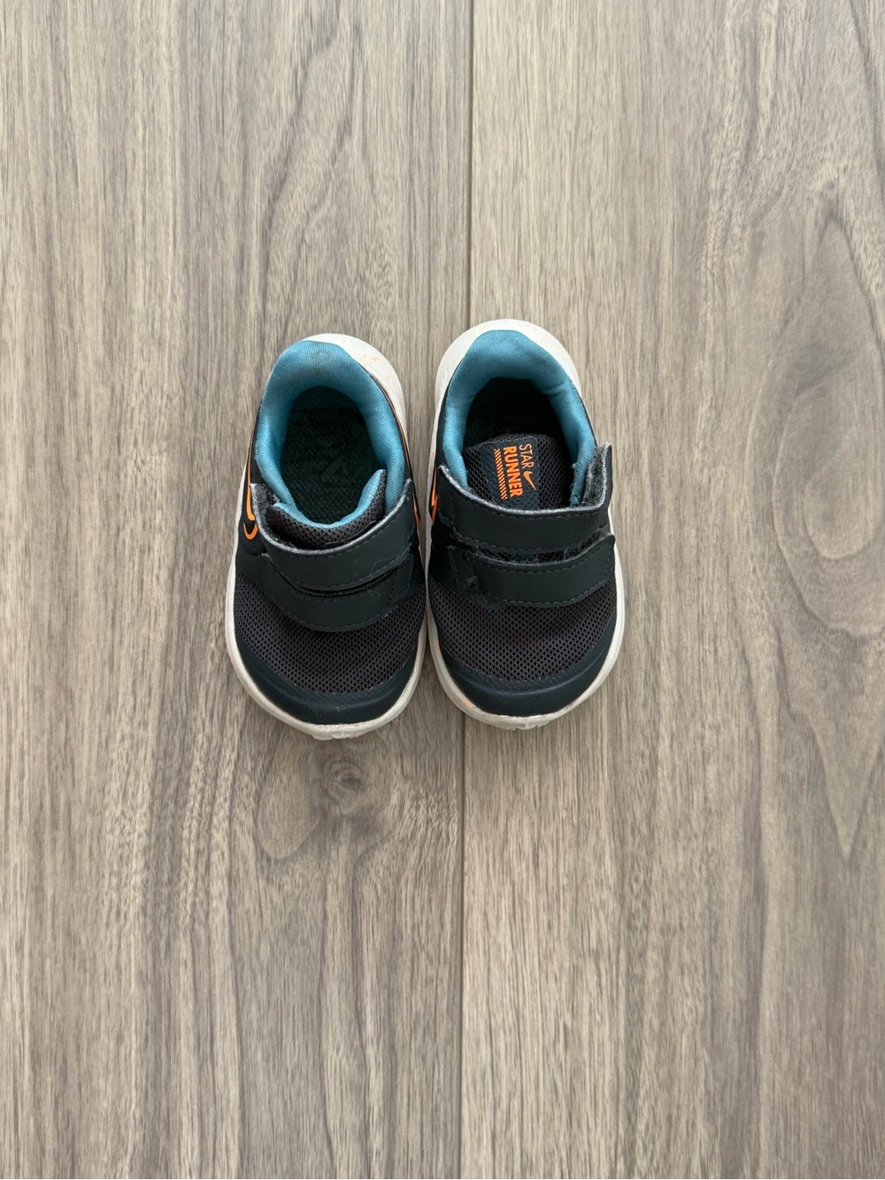 Nike Toddler Black and Teal Athletic Sneakers with Orange Accent